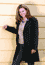 woman wearing frock coat and notch lapel vest